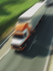  Commercial truck traveling down the highway